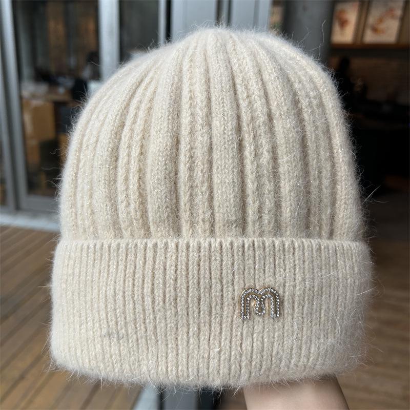 Women's Korean-Style Knitted Beanie: Warm, Thick & Versatile Hat with Ear Protection for Autumn/Winter.