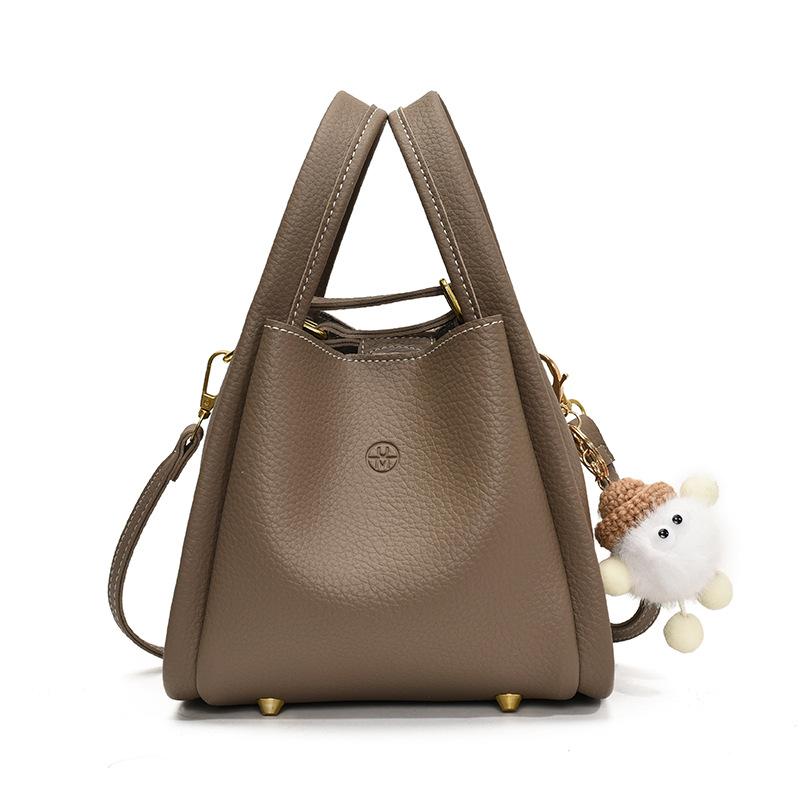 Hand carrying bucket bag women's new casual commuter messenger bag simple vegetable basket bag