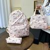 New Cartoon Printed Women's Schoolbag, Junior High School and Primary School Students Reduce the Burden of Three-piece Backpack, Large-capacity