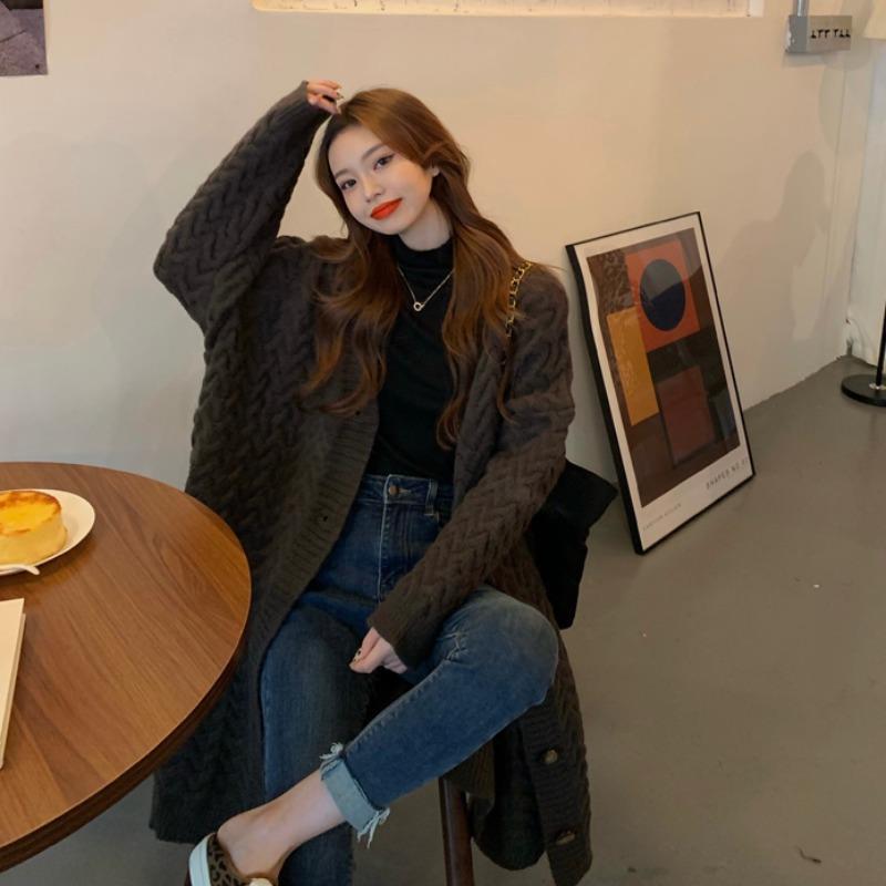 Knitted cardigan jacket women's Korean version twist autumn and winter knee versatile lazy wind loose thickened long outer sweater