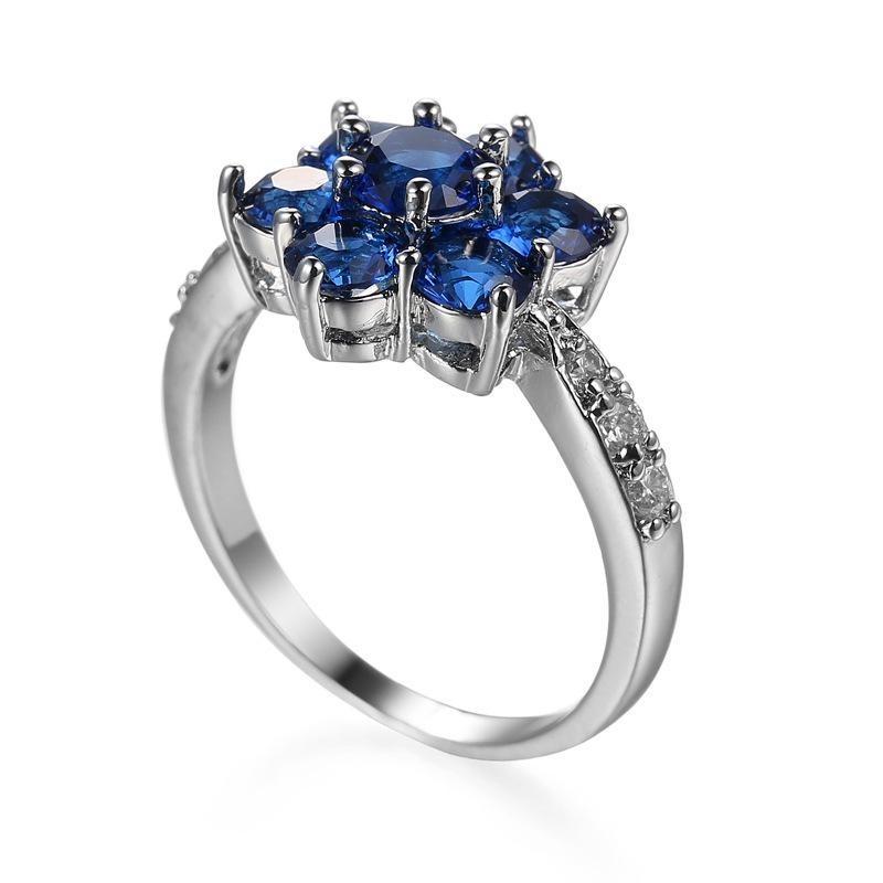 Elegant Blue Flower Shaped Ring For Women With Silver Topaz Detailing In Fashionable Style