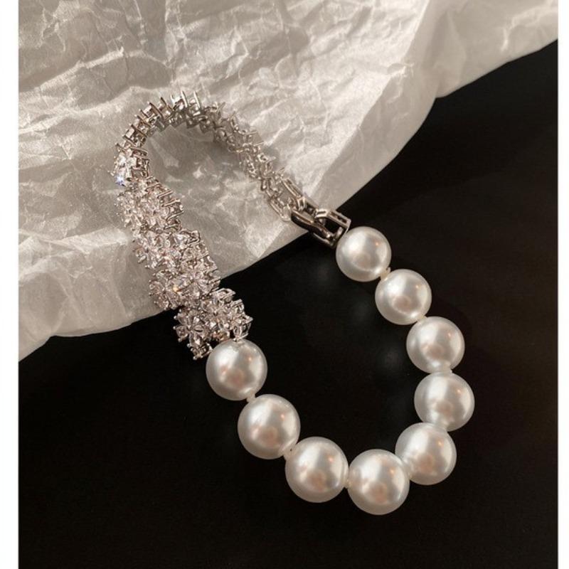 Prosperous full diamond pearl bracelet niche fashion design sense exquisite versatile bracelet light luxury high-end jewelry wholesale