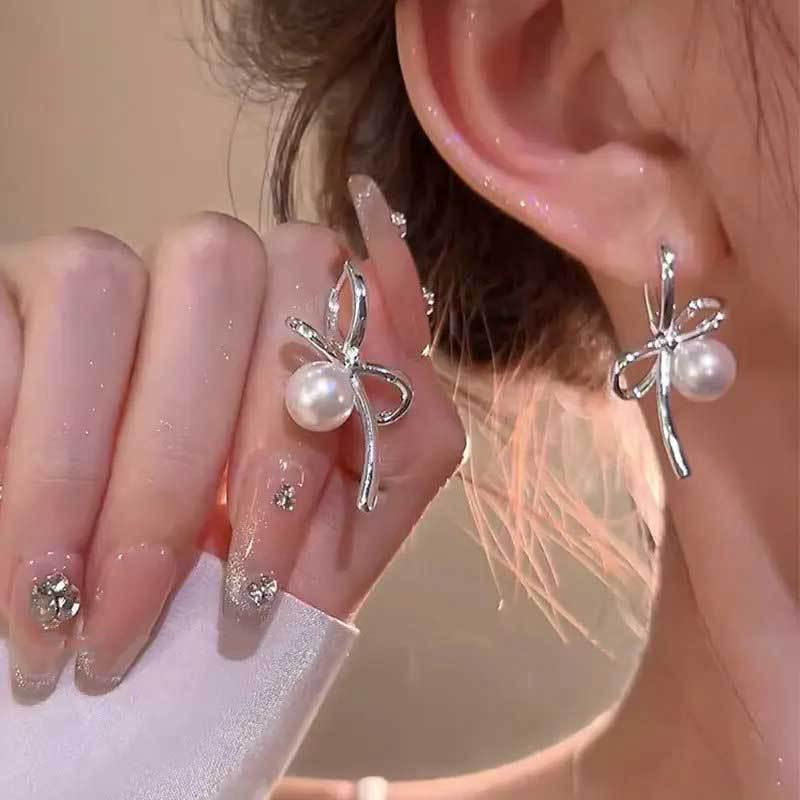 Koreanischer Stil Nicht-Piercing Ohrclip mit langem Quaste, Perlmutt Schmetterlings Design für Damen - High-End, Coole Mode.
