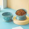 Ceramic Cat & Dog Feeder: Cute, Slanted Double Bowl with High-Leg Design for Neck Protection and Anti-Tip Stability.