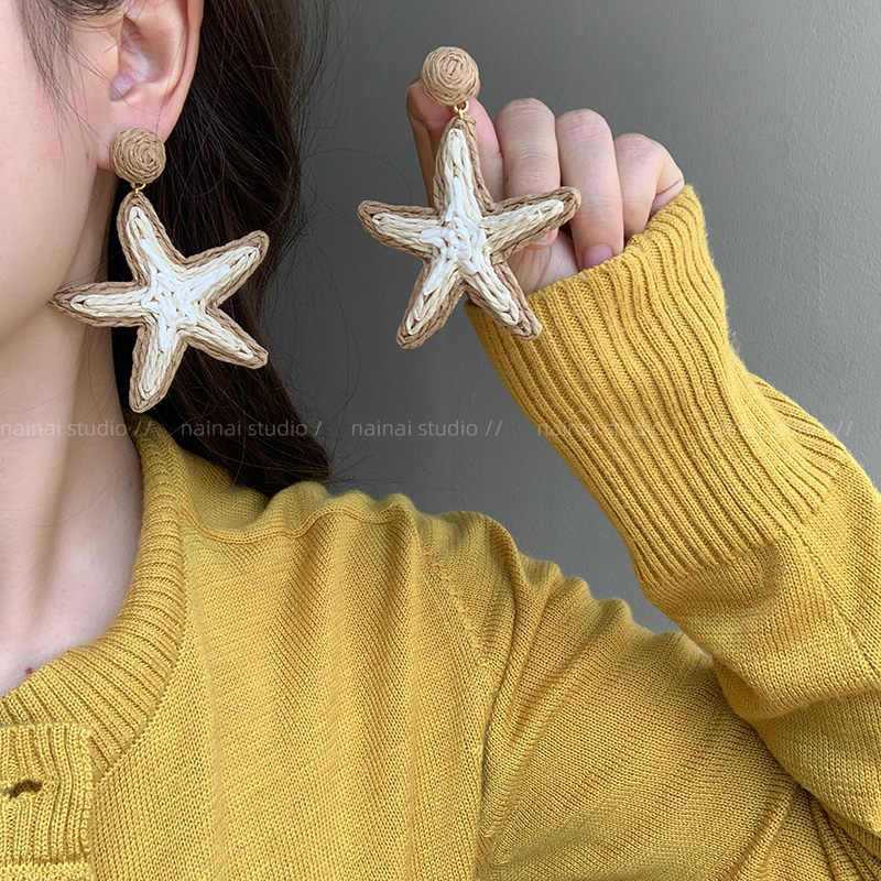 Steel needle flower starfish pendant earrings seaside vacation fashion stud earrings temperament versatile niche design personalized earrings