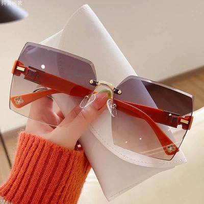 Lunettes de soleil pour femmes à quatre feuilles de trèfle, tendance, sans monture, coupe-bordures, pour la conduite et les voyages