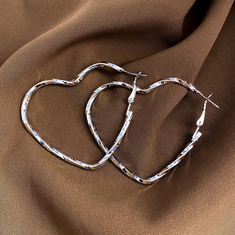 Trendy Twisted Heart Women s Hoop Earrings Copper Color Metal Hollow Love Heart Loop Earrings for Female Irregular Ear Zircon