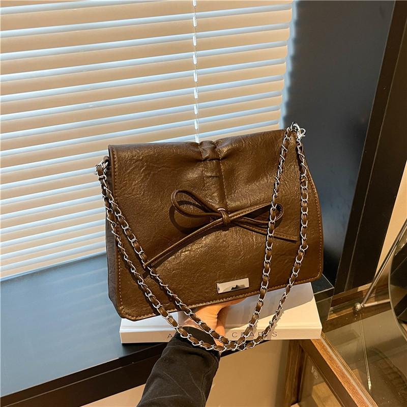 

Foreign style super fire bow tote bag 2025 new large-capacity chain messenger bag fashionable and explosive commuter bag
