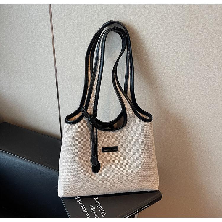

Korean niche shoulder bag women s 2025 simple casual tote bag fashionable large-capacity canvas shoulder underarm bag чёрный