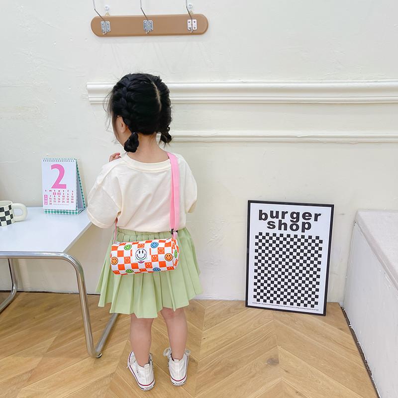 Stylish And Trendy Korean Children's Canvas Crossbody Bag With Fun Smile Face