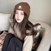 Hat winter female high-value round face student versatile cold-proof warm face small knitted wool hat