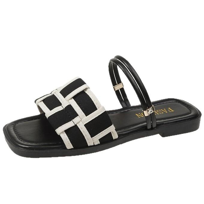 French fairy style flat-bottomed sandals female summer outer wear temperament with skirt 2025 new versatile Roman cool slippers female
