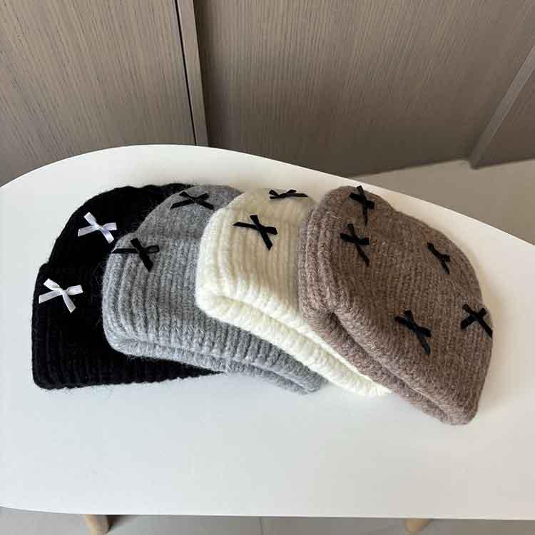 Wool hat women's autumn and winter new bow knitted hat shows a small face, warm ears, bag head, all-match cold hat