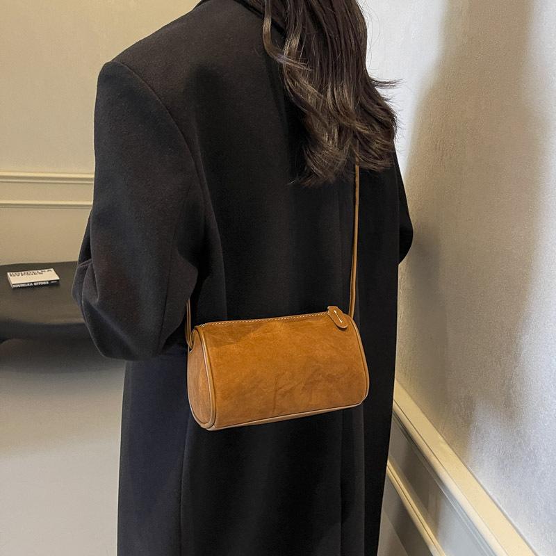 Retro matte suede bag women's new simple casual daily shoulder messenger bag commuter cylinder bag