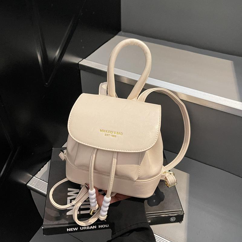 Trendy simple backpack new drawstring pleated women's bag going out travel small backpack