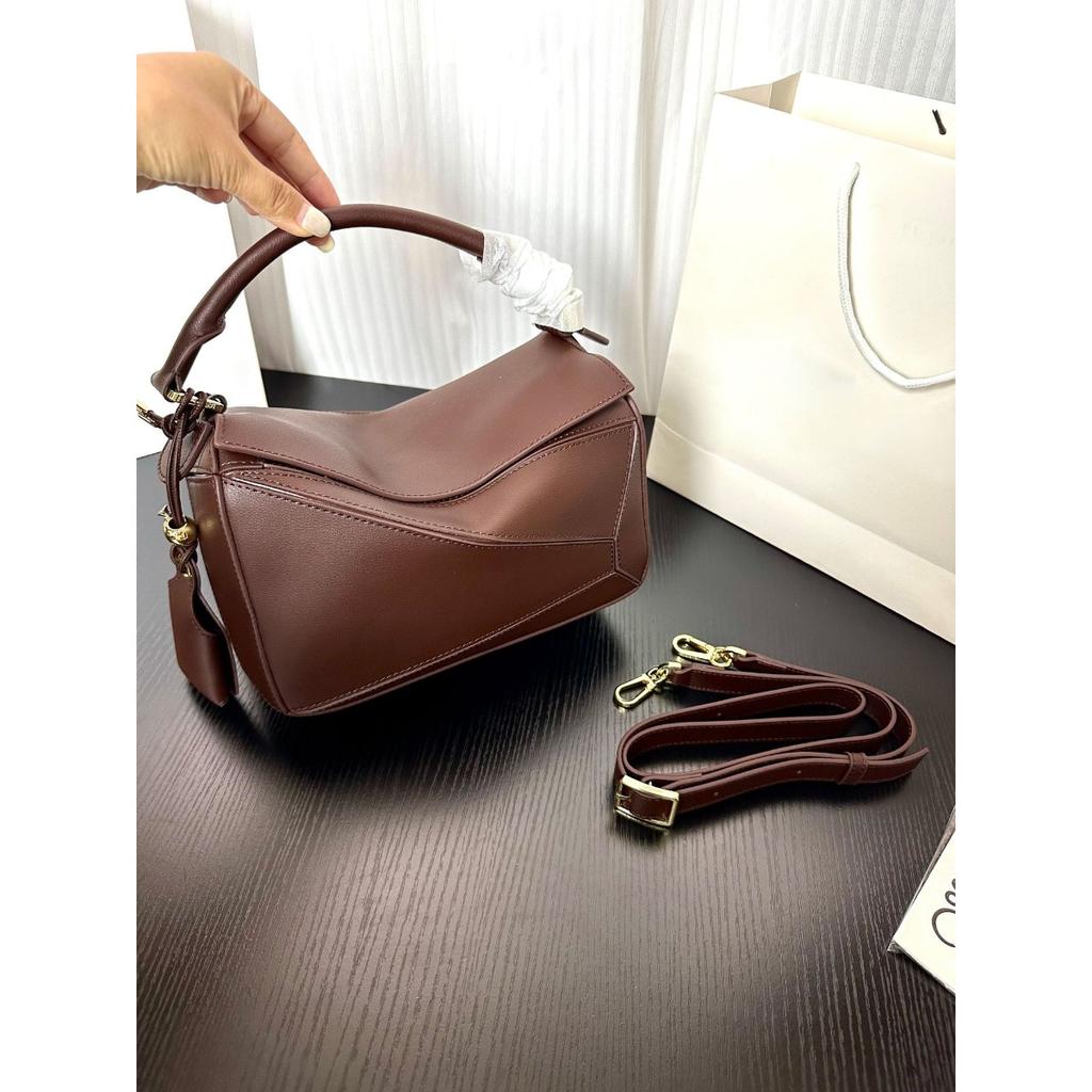 Version haute couture Luo Jia nouveau sac pendentif géométrique puzzle assemblage irrégulier sac coussin sac bandoulière portable en cuir