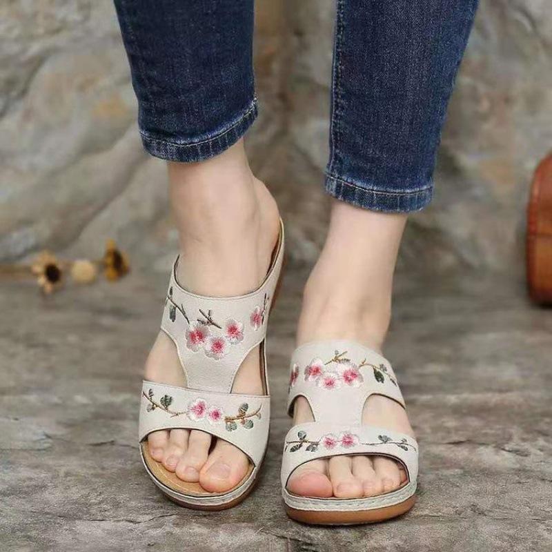Summer new hollow flower embroidered sandals flat-soled large size rocking thread cool slippers