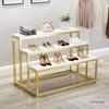 Creative Children's Clothing Display Rack with Faux Marble Waterfall Table
