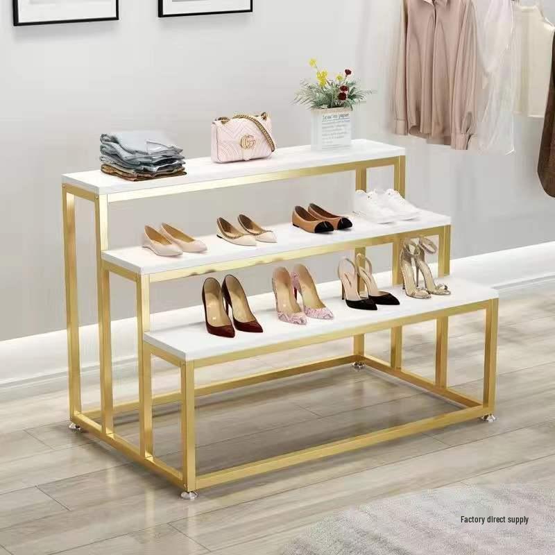 Creative Children's Clothing Display Rack with Faux Marble Waterfall Table