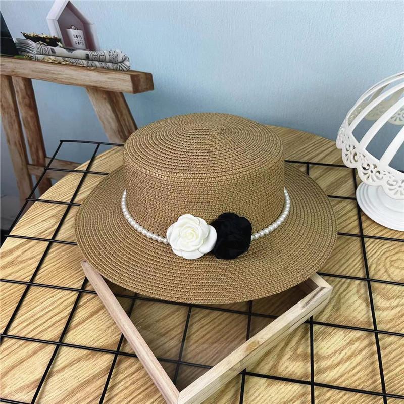 Xiaoxiangfeng flat top elegant straw hat women's spring and summer new beach hat flat brim sun protection wide edge shading versatile top hat tide
