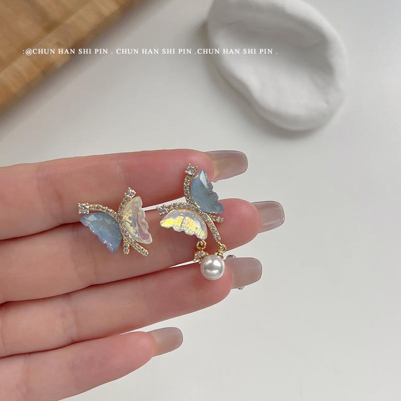 

Super fairy butterfly asymmetrical mosquito coil disc ear clips, colorful crystal earrings women s ins niche high-end spring and summer earrings