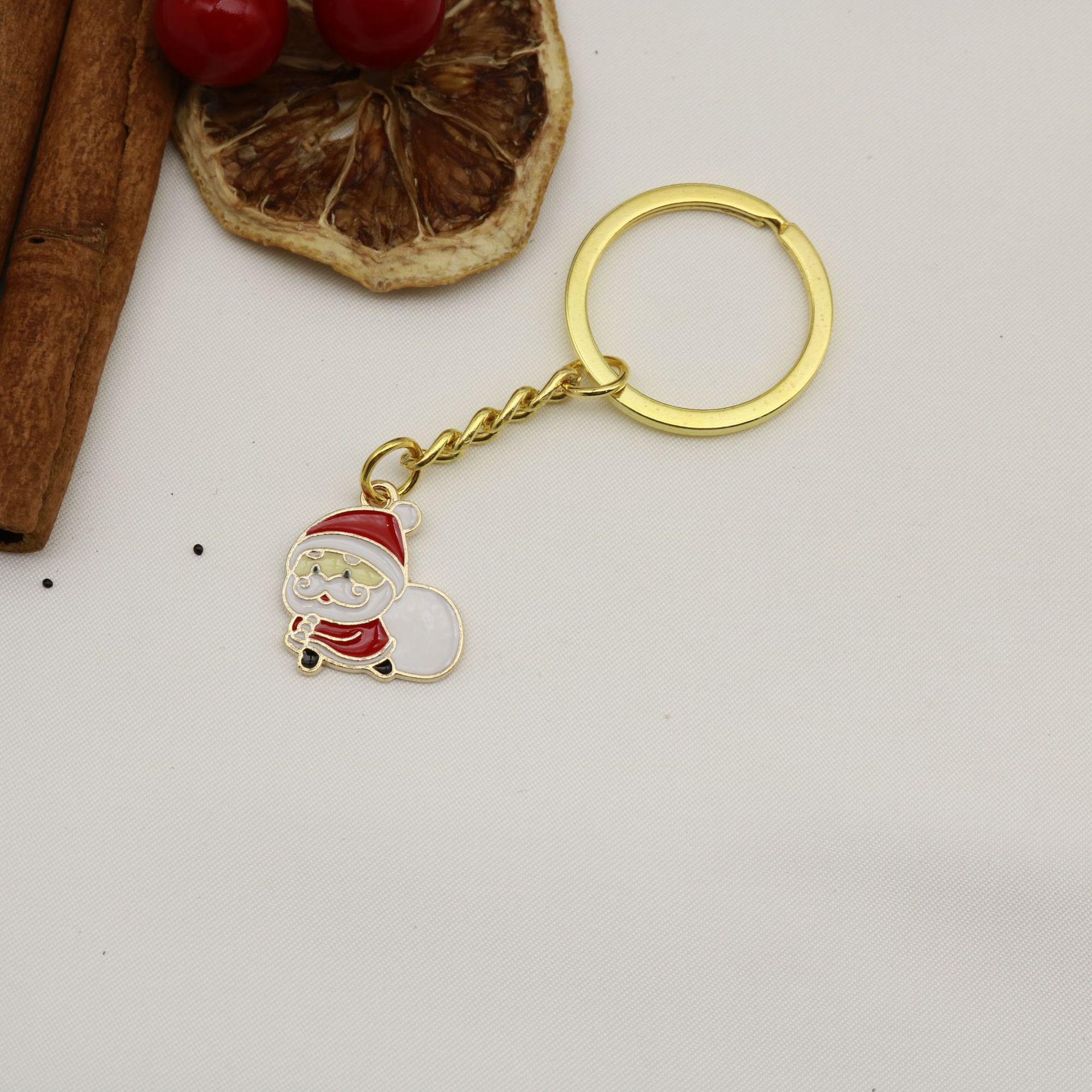 Santa Claus Christmas Tree Bells and Gloves Keychain Ornament золотой
