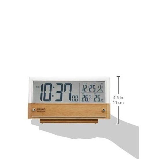 Seiko Clock tabletop alarm radio-controlled digital calendar temperature humidity display see-through LCD light brown wood grain pattern body size