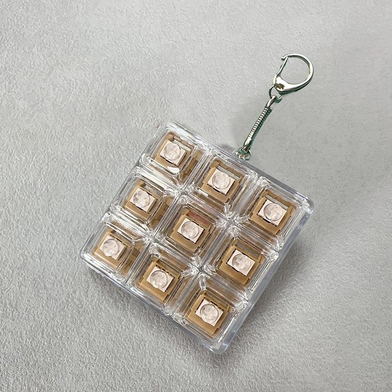 Tastiera a 9 Tasti Keycaps Portachiavi Giocattolo Fidget Keycaps Anti-Ansia Keycaps Festa Sollievo dallo Stress Keycaps Fai-da-Te Tappi Tastiera Giocattolo