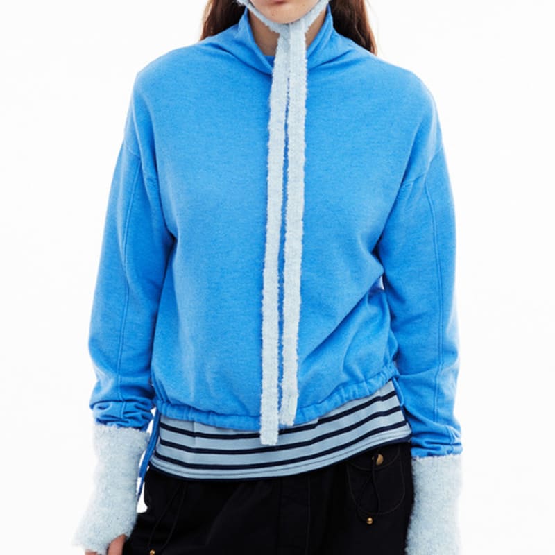 FENNEC BOUCLE HAND WARMER - POWDER BLUE