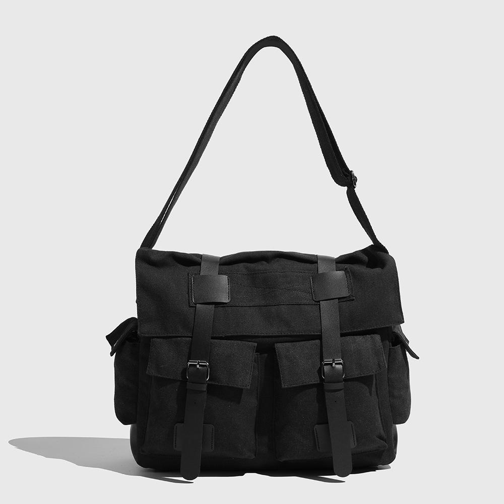 

Large capacity canvas shoulder bag with a slanted design can hold a laptop and is perfect for daily travel. Its design is simple and versatile. чёрный