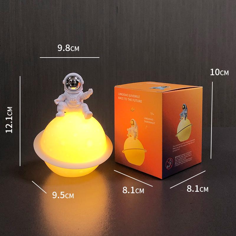 Astronaut Night Light Planet Lamp: Luminous Moon Ornament for Bedroom Decor, Gift, or Souvenir with Silk Flower.