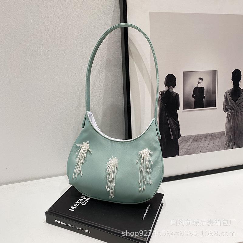 

This year s popular portable small bag women s 2025 new manufacturer multi-color shoulder armpit bag