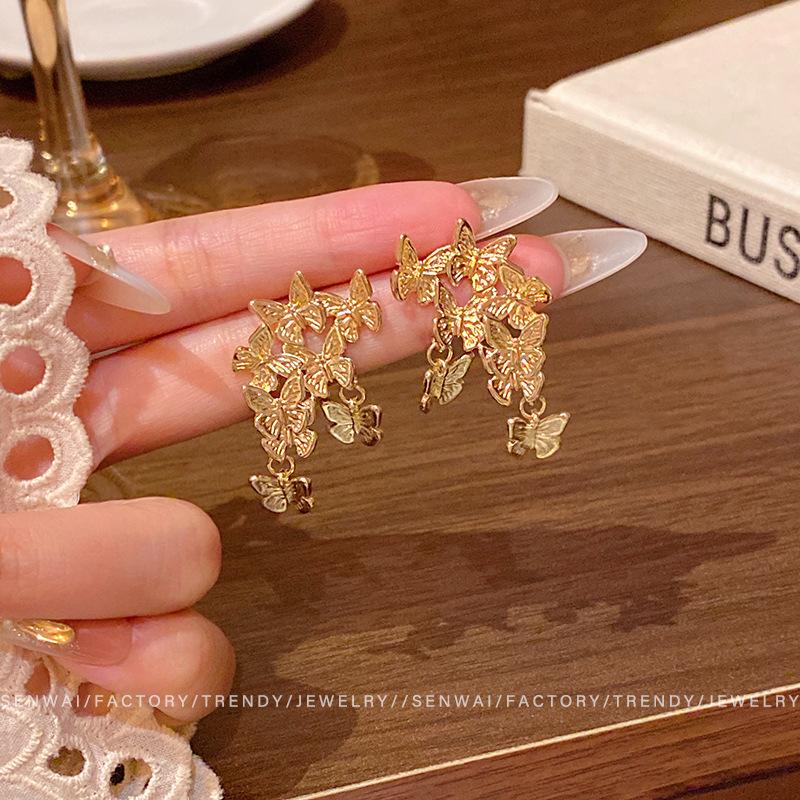Retro gold butterfly fringed earrings women's light luxury temperament high-end stud earrings New ear jewelry