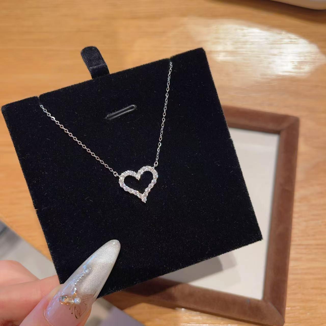 Beixi S925 Sterling Silver Heart Necklace: Elegant, Platinum-Colored, with Diamond Inlay.