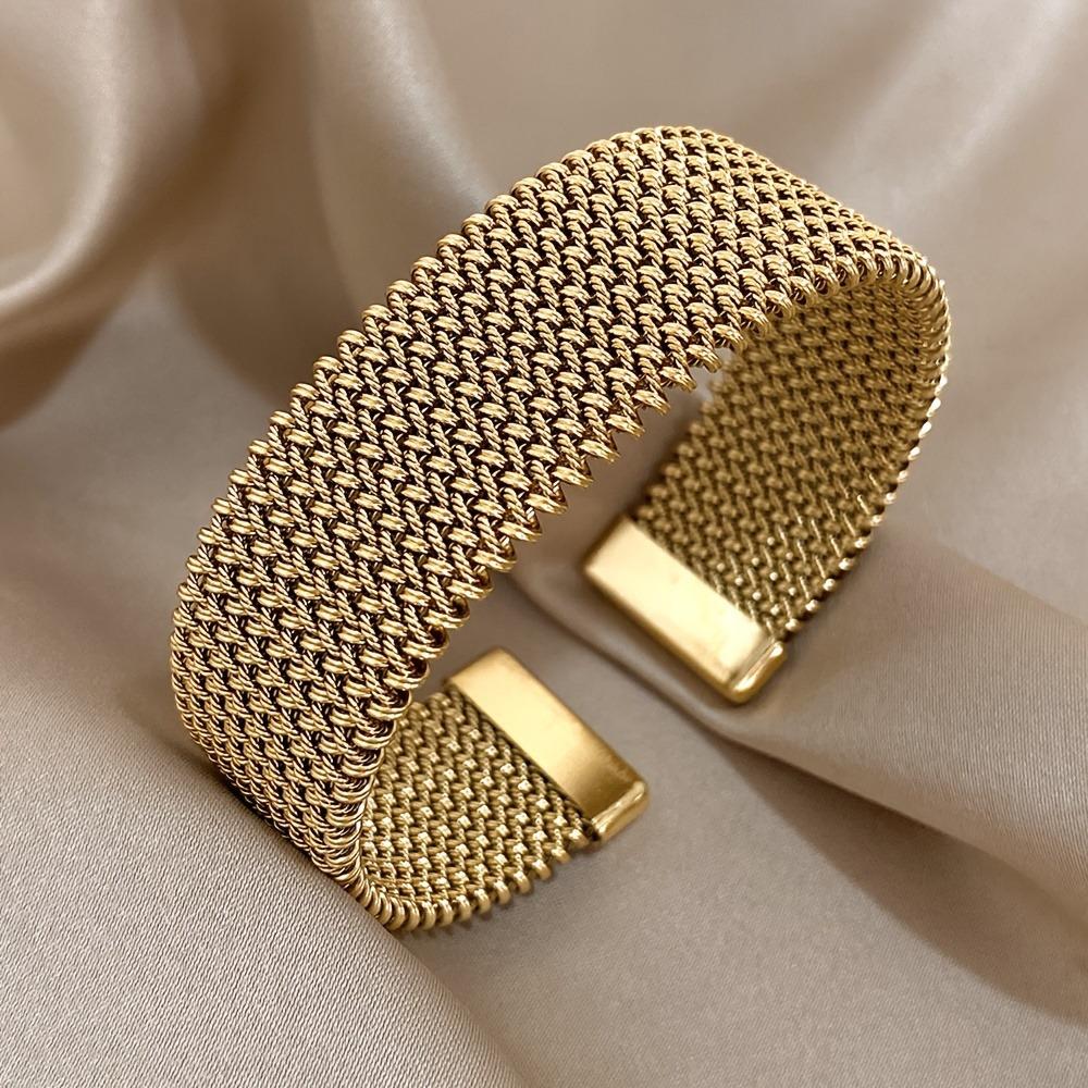 European & American Fashion Titanium Steel Woven Bracelet Plated with 18K Gold - Colorfast Jewelry.