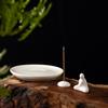 Zen-Style Formless Buddha Incense Holder: Simple White Porcelain Monk for Living Room or Study Decor.