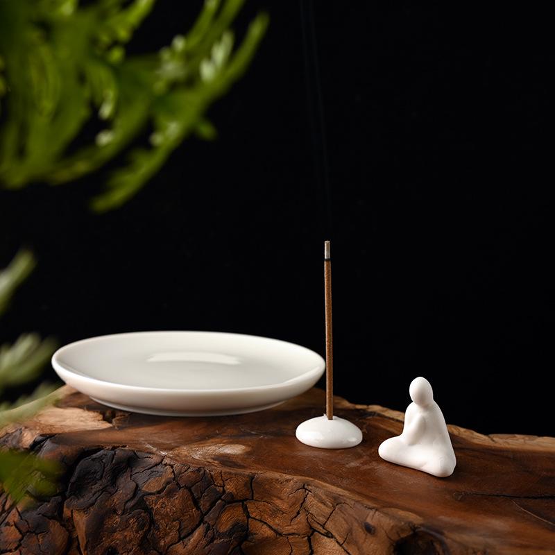 Zen-Style Formless Buddha Incense Holder: Simple White Porcelain Monk for Living Room or Study Decor.
