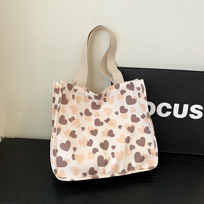 Large-capacity bag women's 2025 spring and summer new cute versatile shoulder bag love portable commuter tote bag
