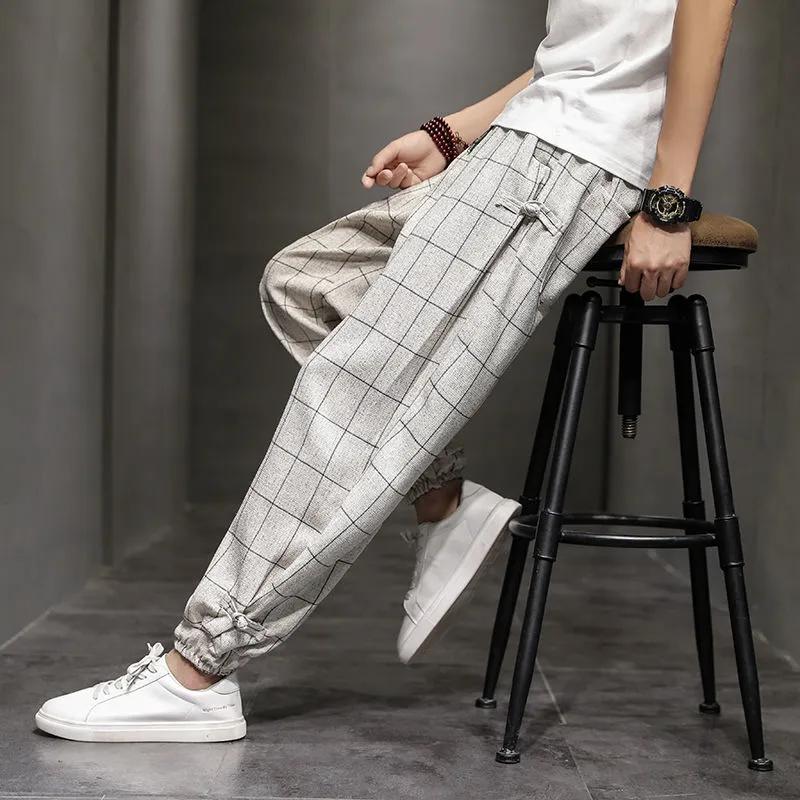 Pantalones casuales a cuadros de algodón y lino de estilo chino para primavera y otoño, pantalones anchos con cordón para hombre, pantalones harén holgados de lino, pantalones de talla grande