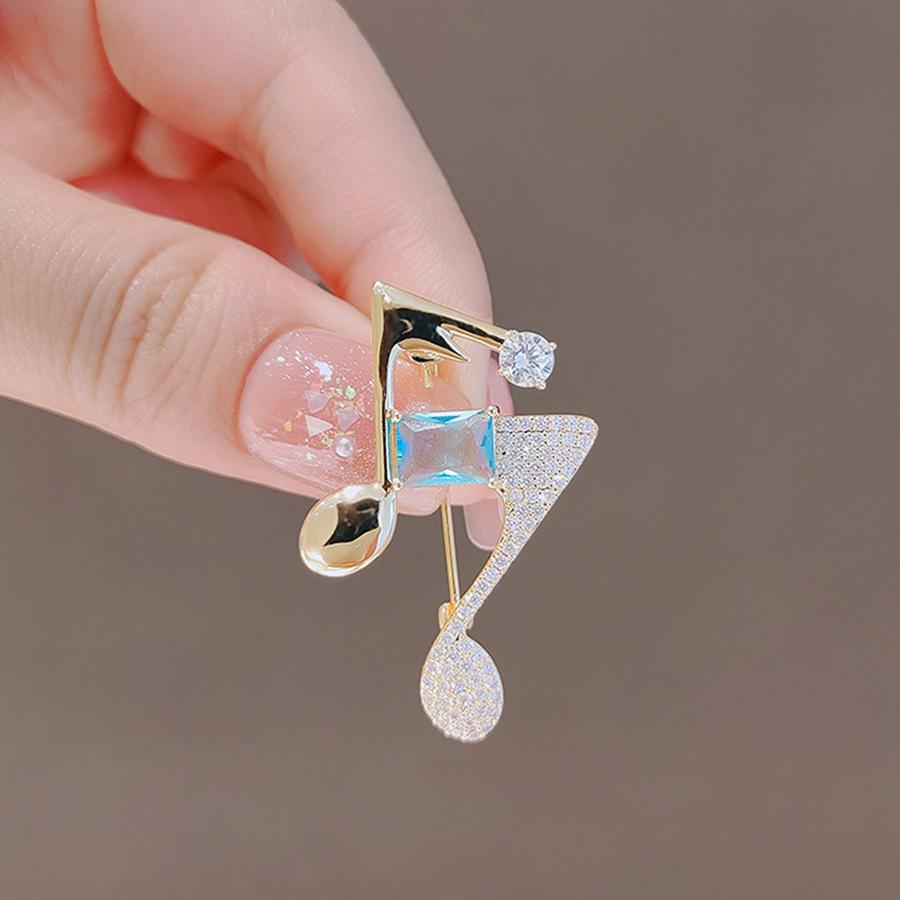 Fashion music note brooch women's high-end sense high-end personality versatile pin niche design high-end corsage versatile accessories