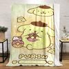 Cute yellow character with brown hat holding donuts, surrounded by sparkles. for all seasons blanket lunch break throw gift