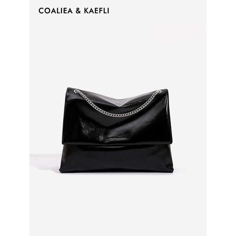 

Hong Kong Brand Large Capacity Wedding Bag Chain Underarm Bag Women 2025 New Commuter Tote Bag Shoulder Messenger Bag Black counter genuine goods [collection gift bag]]