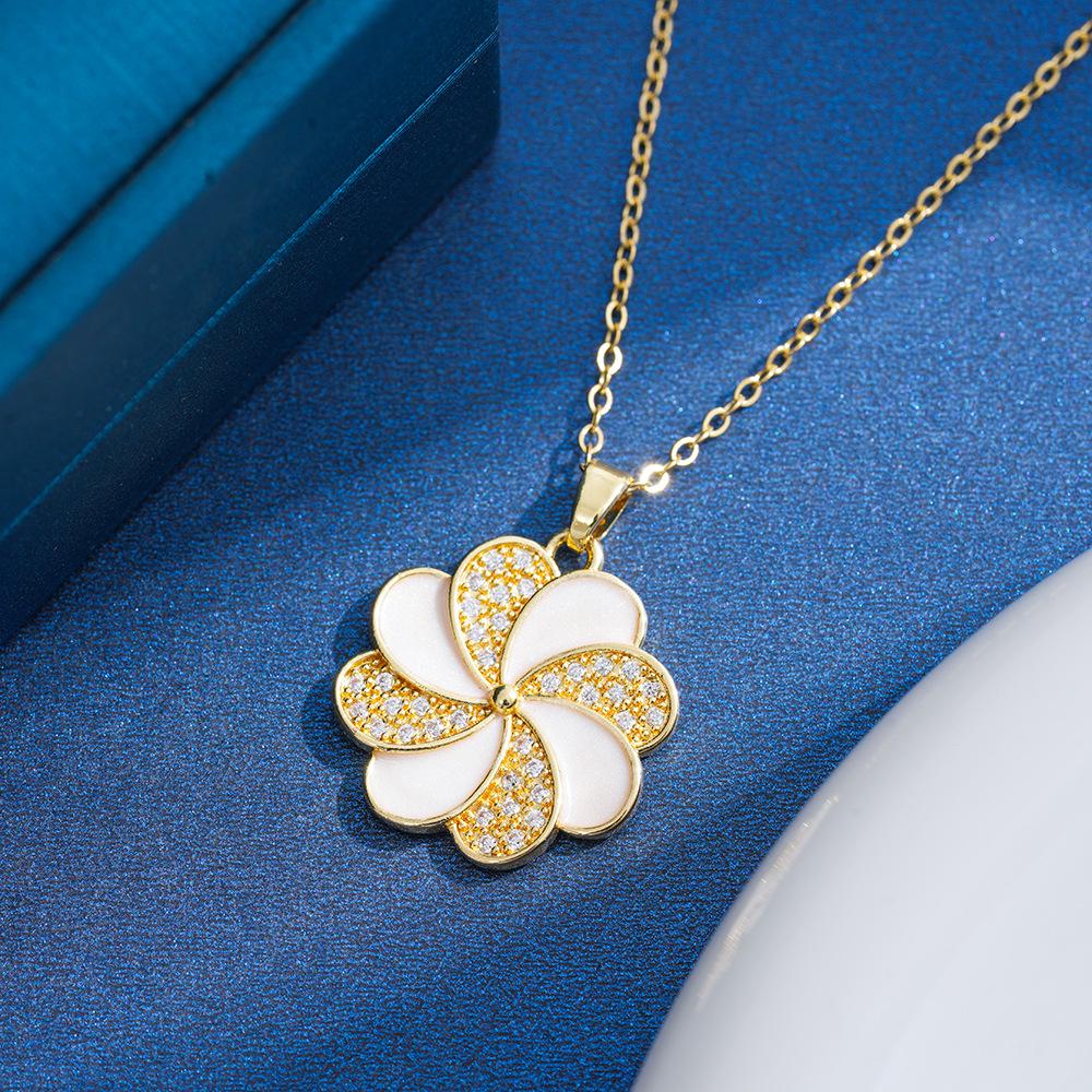 European & Korean Diamond Black White Drip Glaze Flower Windmill Necklace - Niche Clavicle Chain Design for Women