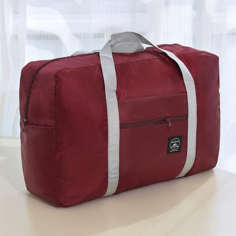 

Foldable Large-Capacity Travel Bag with Telescopic Handle – Multi-Functional & Portable Luggage Solution бордовий