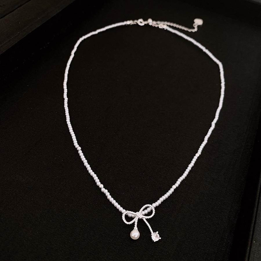 

Pearl zircon bow pendant necklace simple fashion small fresh collarbone chain versatile temperament high-end jewelry