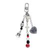Unique and Stylish Beaded Keyring Dark Themed Skull Heart Cross Pendant Keychain Accessory for Fashion Enthusiasts