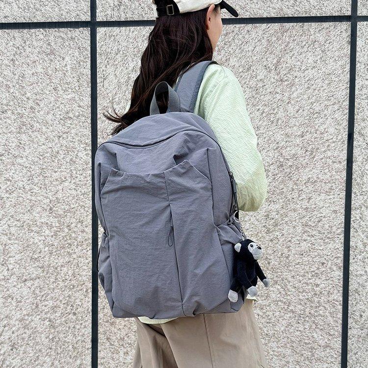 Schoolbag1011 new large-capacity junior high school backpack college student computer bag solid color schoolbag unisex
