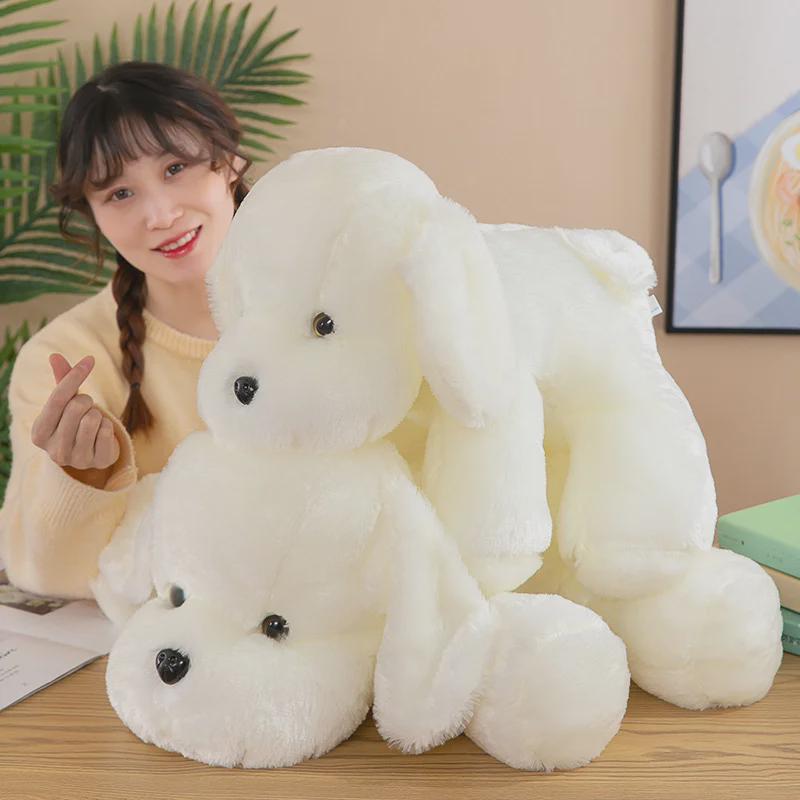 Entzückendes weißes Hundeplüschtierkissen für Kinder