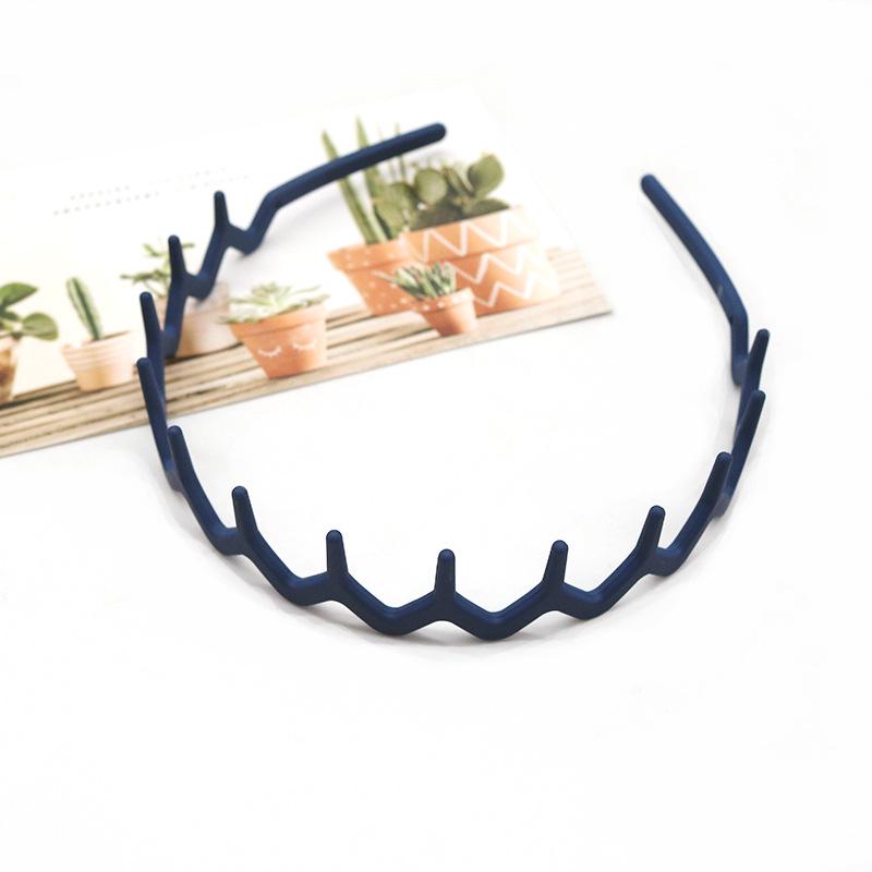 Buntes, wellenförmiges koreanisches Zahnkamm-Haarband - Rutschfest, schonend zum Haar, Bequemer Sitz, Ideal zum Bändigen von Babyhaaren.