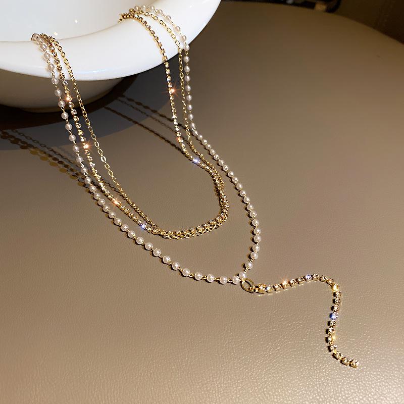

Light luxury temperament multi-layer flash diamond Y-shaped pearl necklace women s niche design collarbone chain neck accessories new neck chain